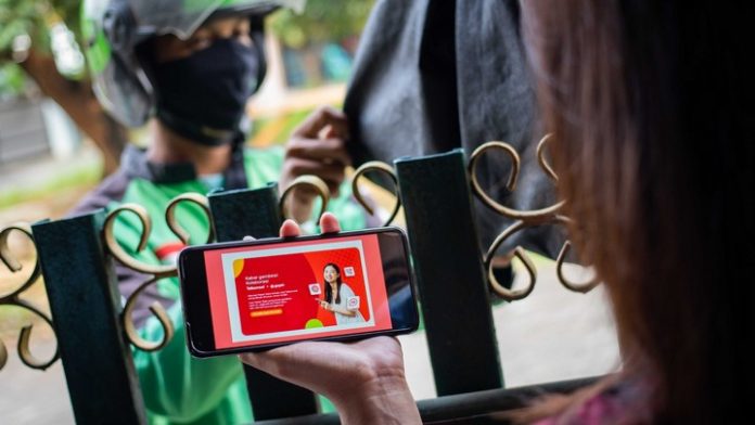 Sinergi Telkomsel dan Gojek